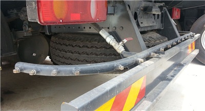 Street sweeper truck rear high-pressure nozzles for dust suppression